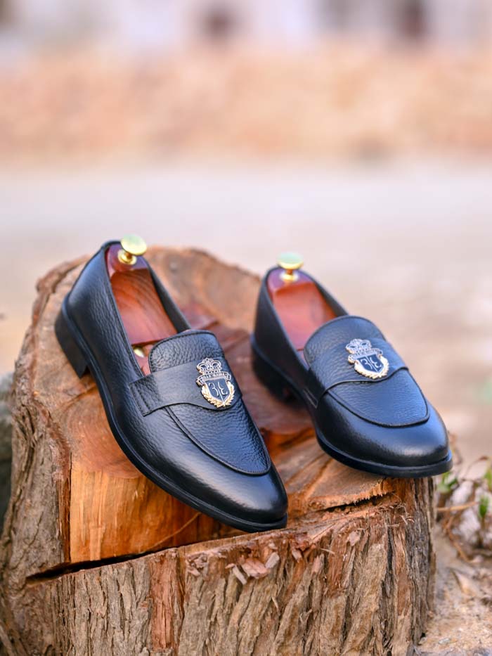 Men's black leather loafer with rubber sole - front view
