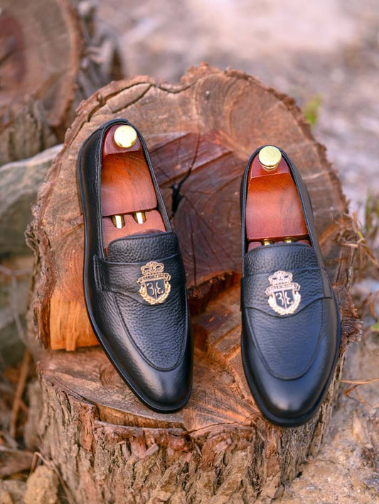 Black leather loafer - side profile showing sole