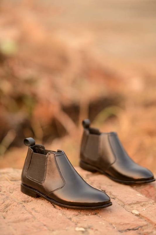 Men's black leather Chelsea boots - front view