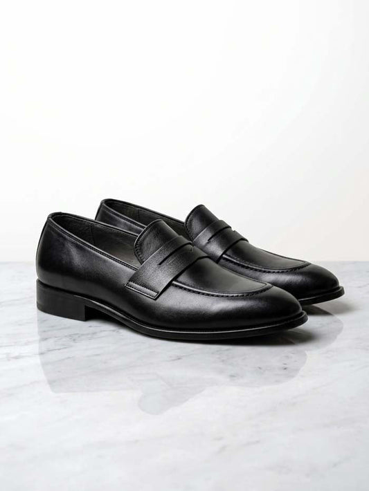 Black leather slip-on loafer for men, angled view showing stitched rubber sole - SP 471